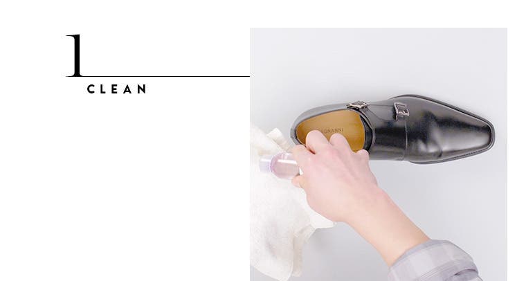Cleaning leather shoes.