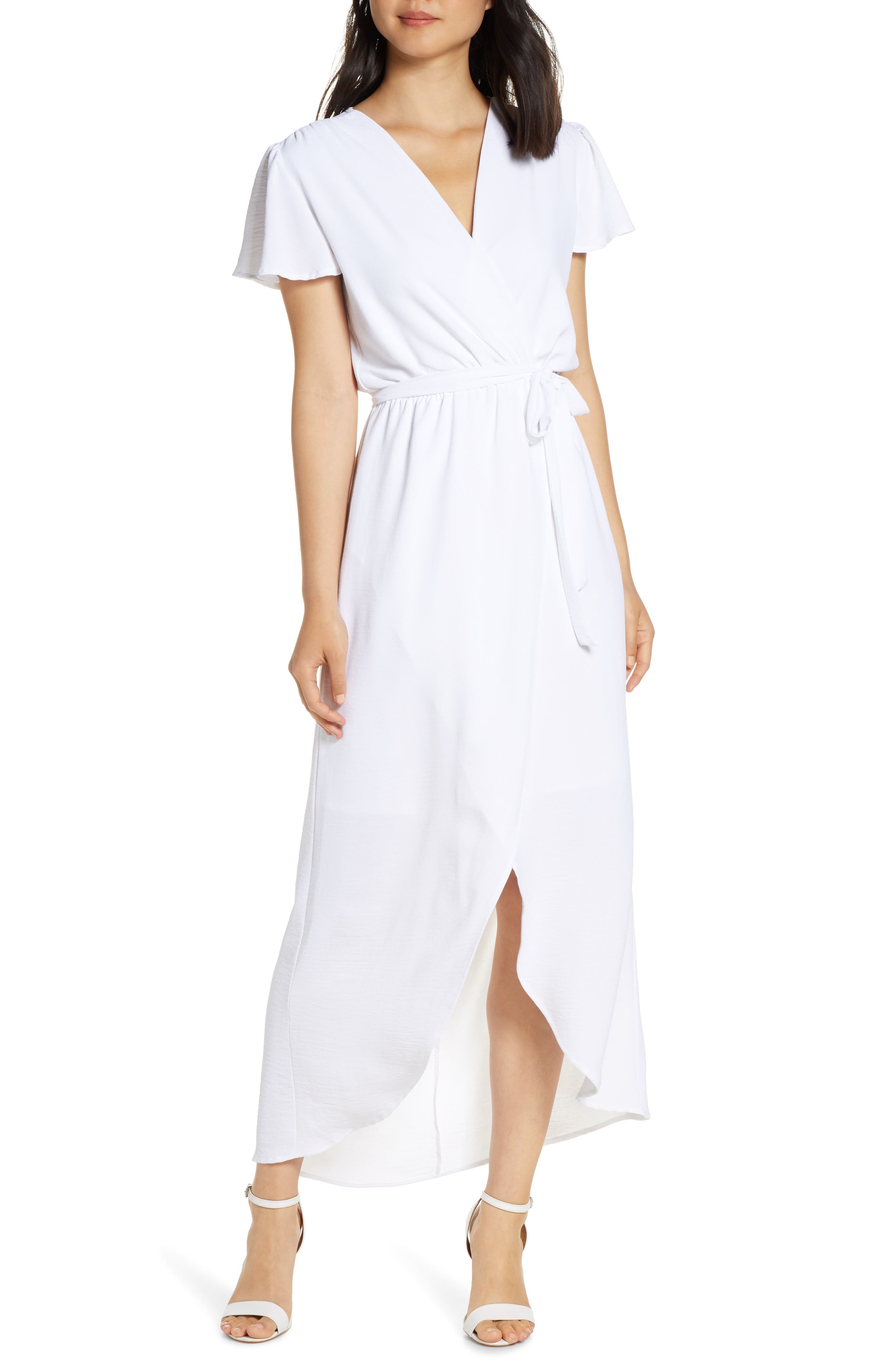 white flowy maxi dress with sleeves