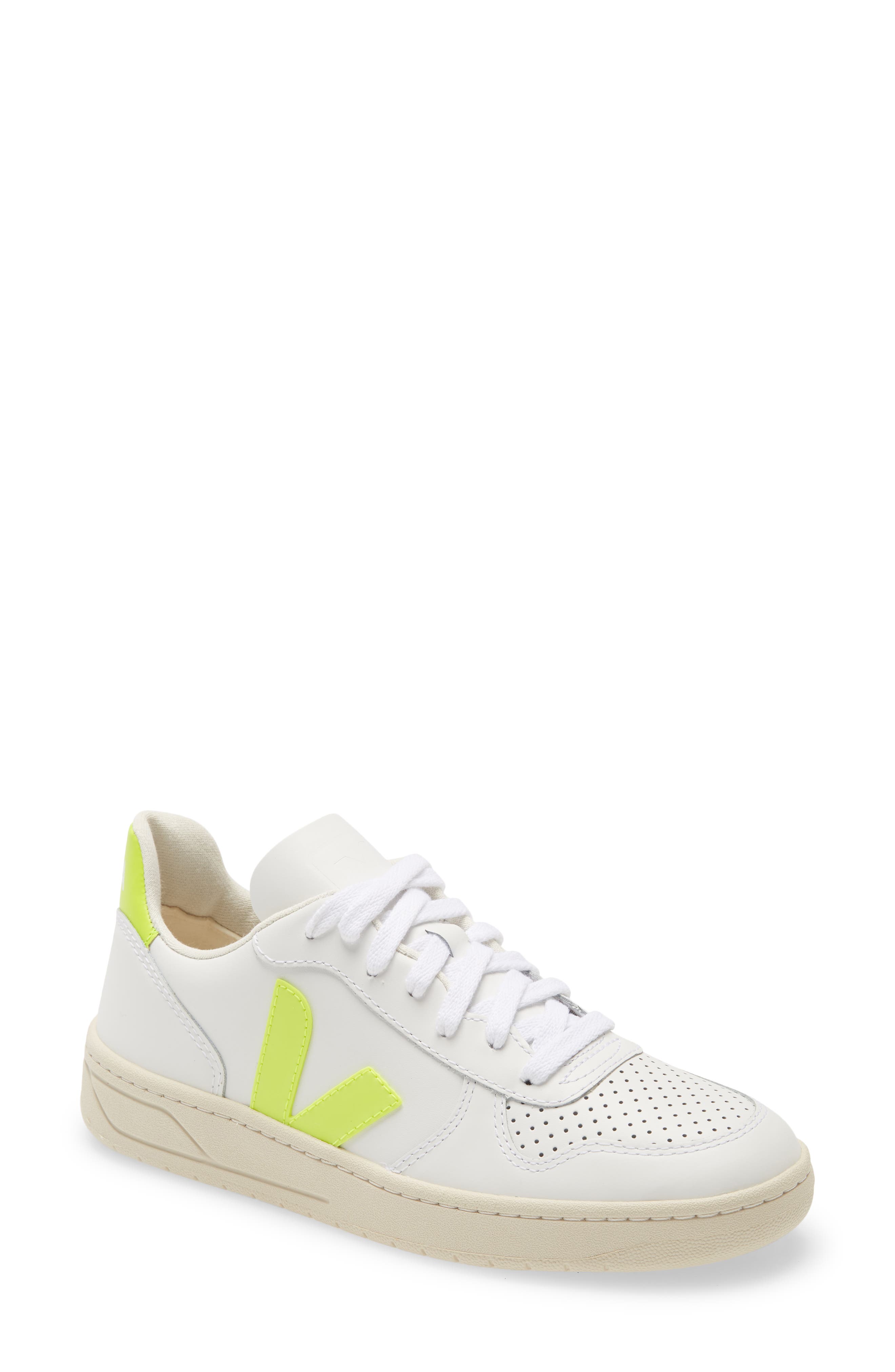 white sneakers with v on the side