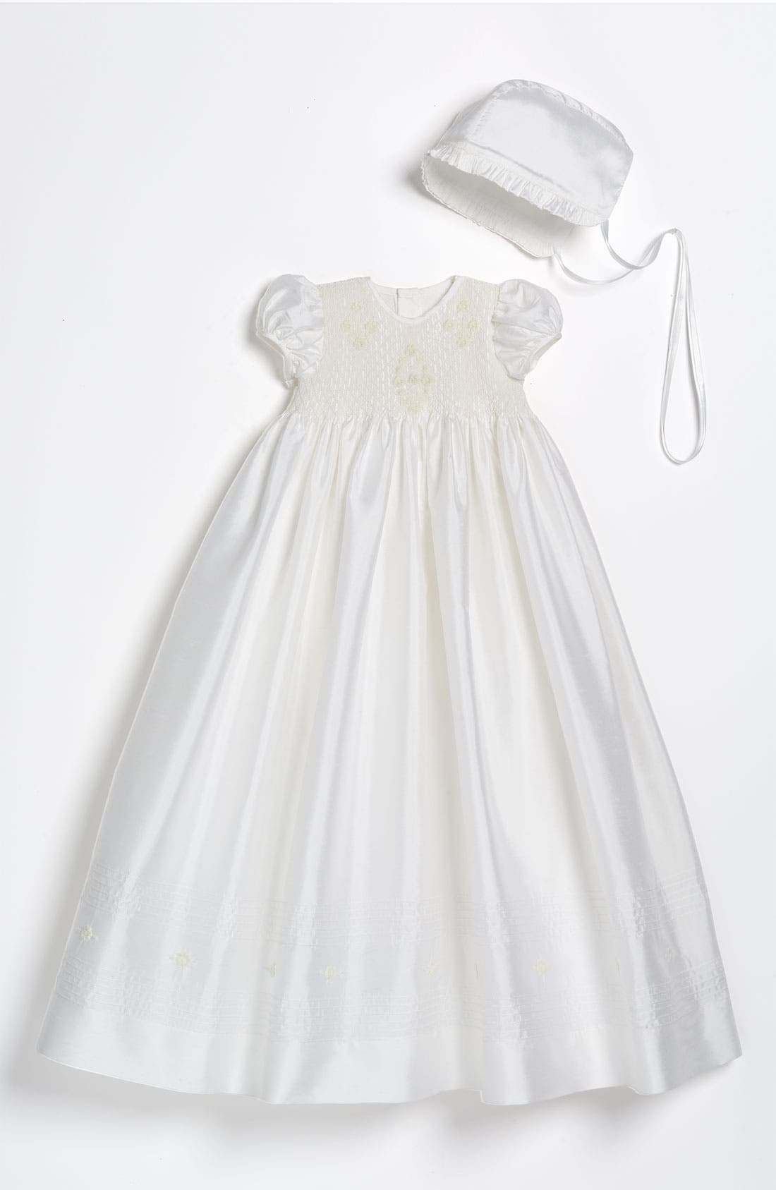 baby girl in white dress