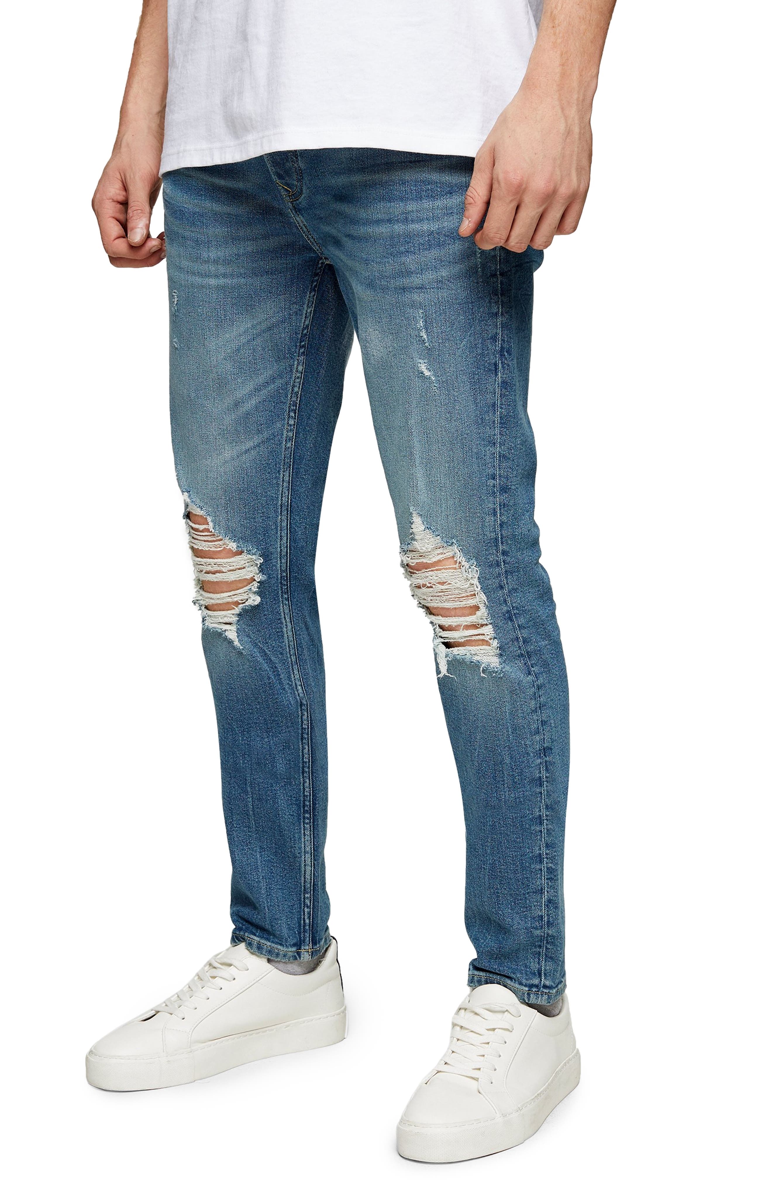 holey bootcut jeans