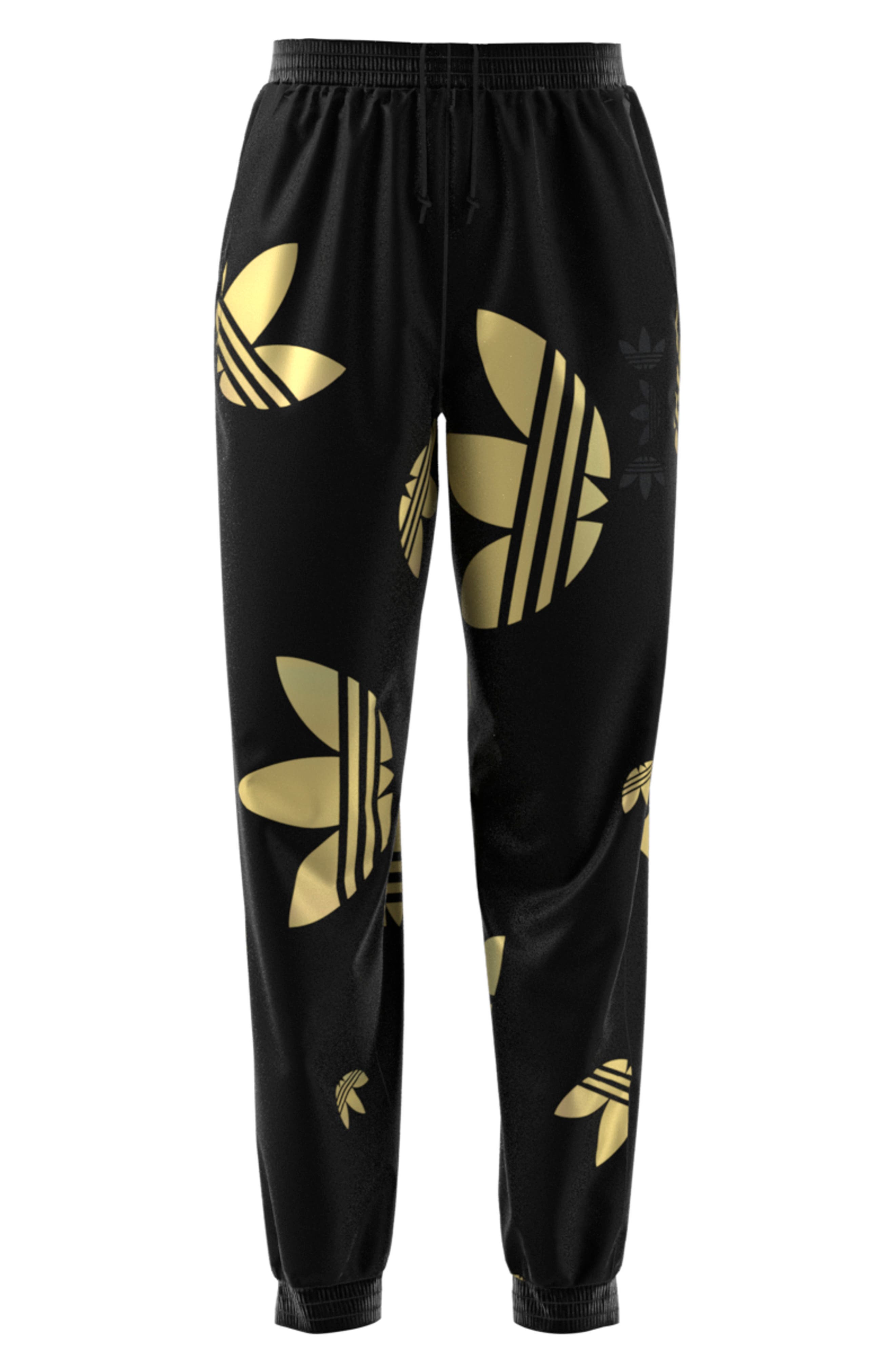 white and gold adidas sweatpants