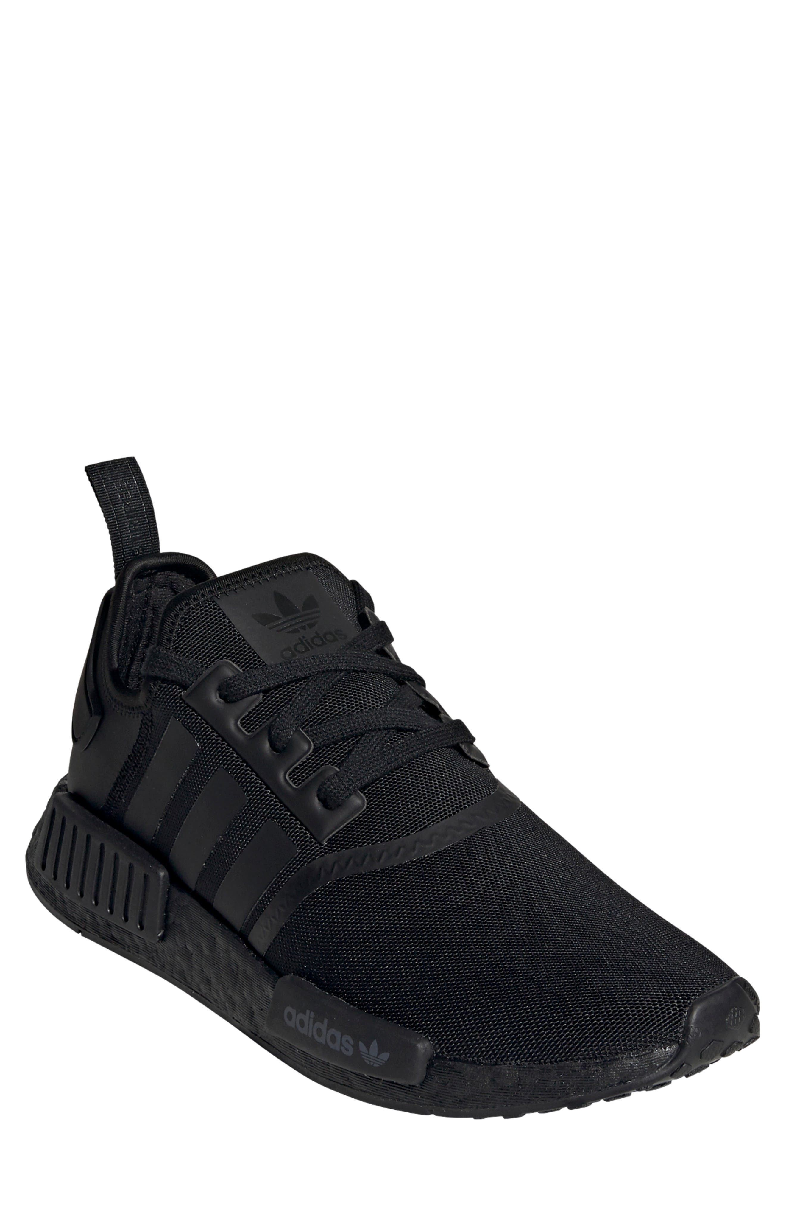solid black adidas shoes