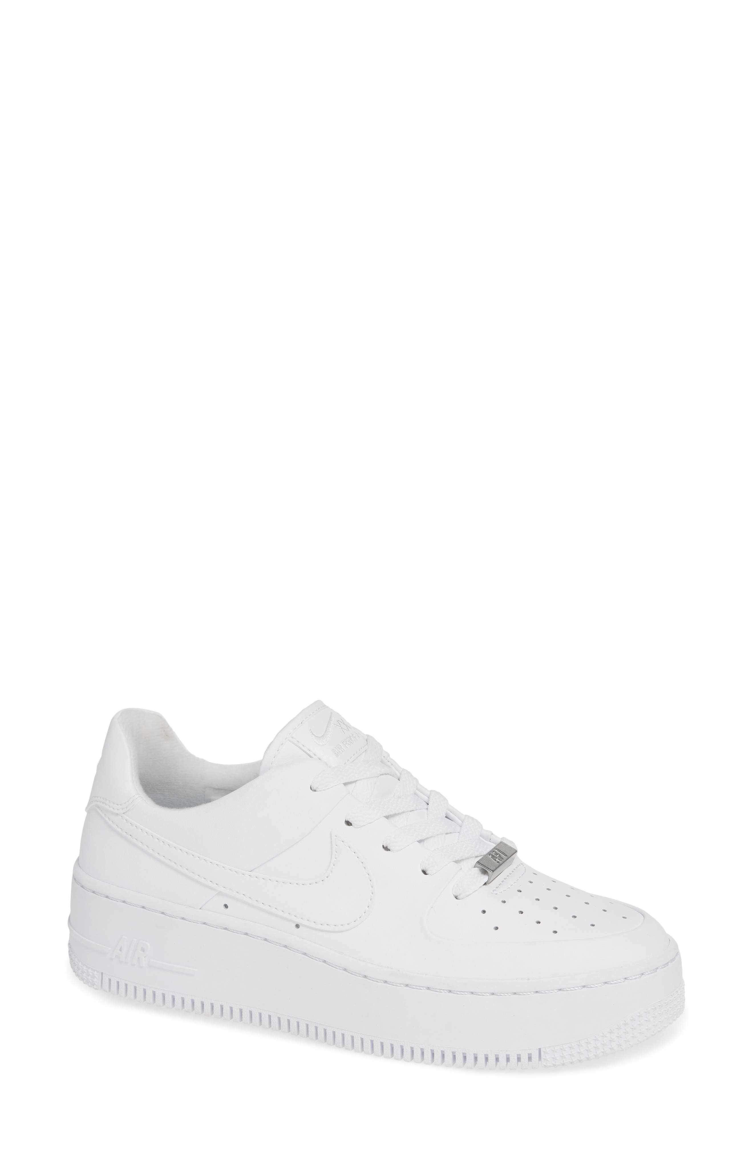 white bulky tennis shoes