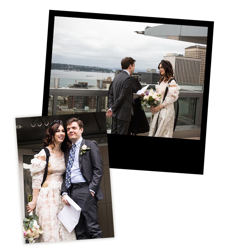 The bride and groom exchange vows on the rooftop at the courthouse.
The bride and groom pose outside the courthouse after saying "I do."