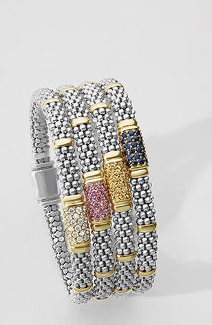 Four LAGOS Signature Caviar bracelets with white diamonds, pink sapphires, yellow sapphires and blue sapphires.