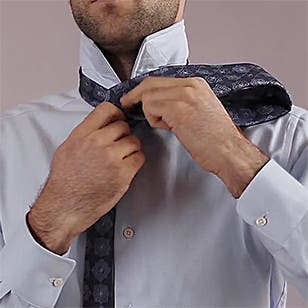 How to tie a half-Windsor knot.