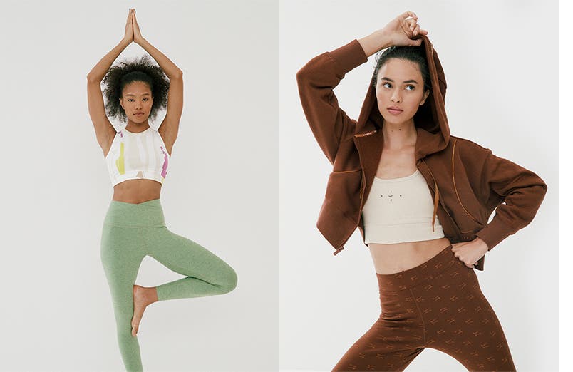 Woman wearing a white active crop top and green high-waist yoga leggings. Woman wearing a brown hoodie, brown high-waist leggings and cream crop top from Nike.