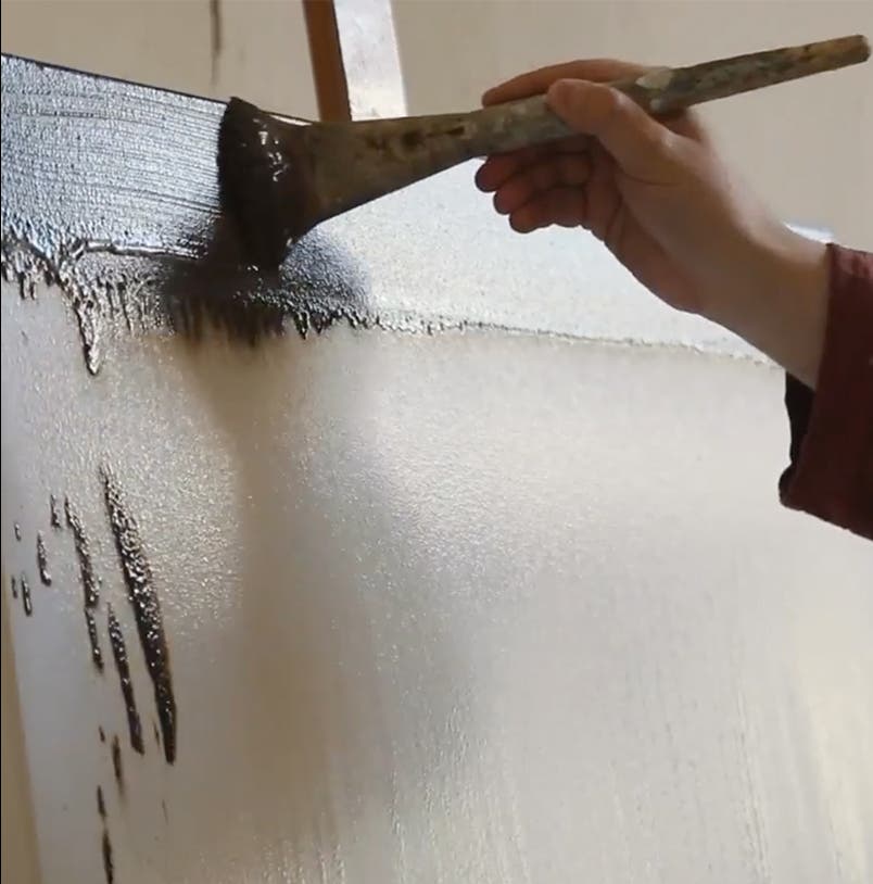 A video of an artist at work.