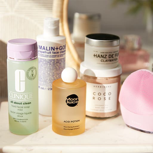 A variety of skin care products from different brands.