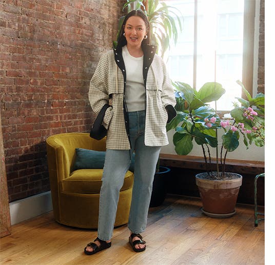Model Mia Kang wearing jeans, a white tee and printed jacket.