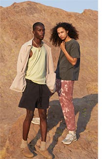 Two young adults wearing clothing from PacSun.