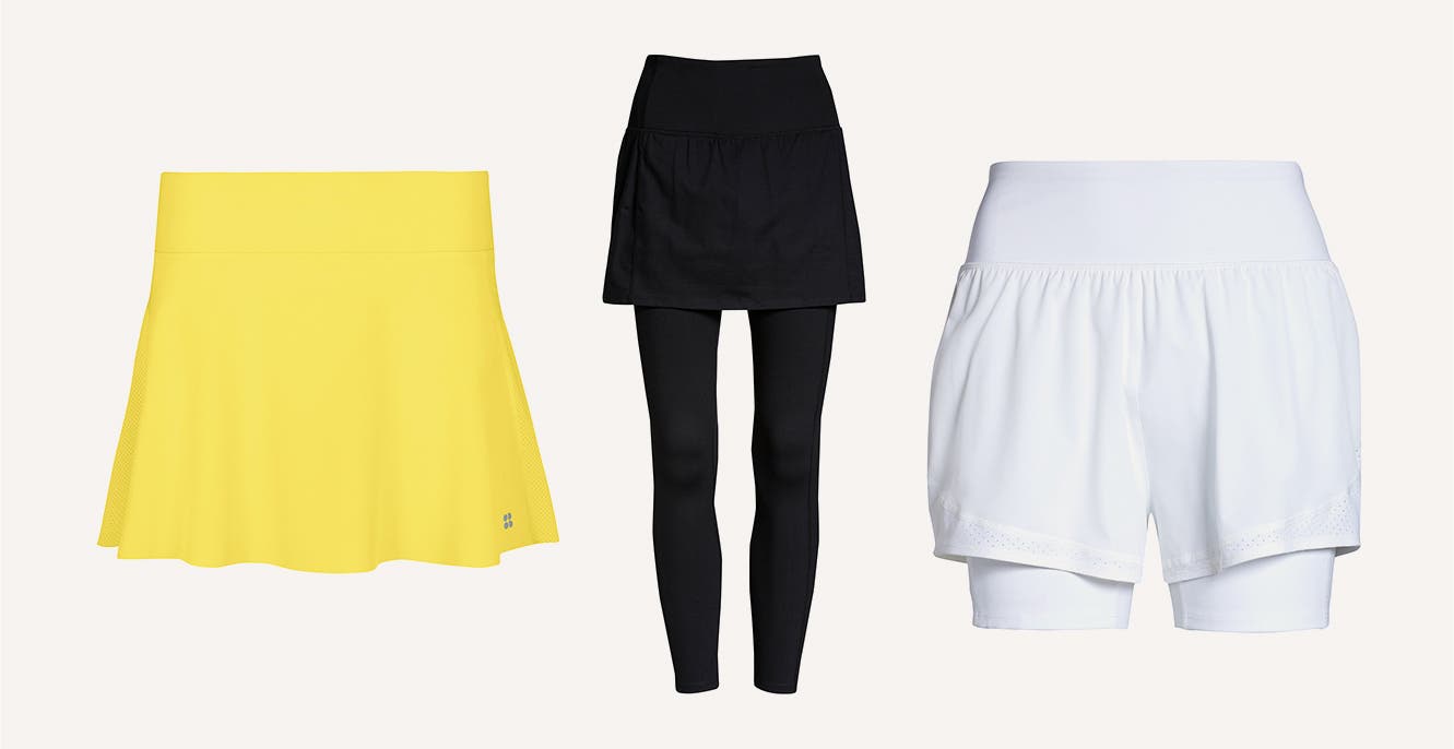 A yellow tennis skort; black skirted leggings; white double-layer shorts.