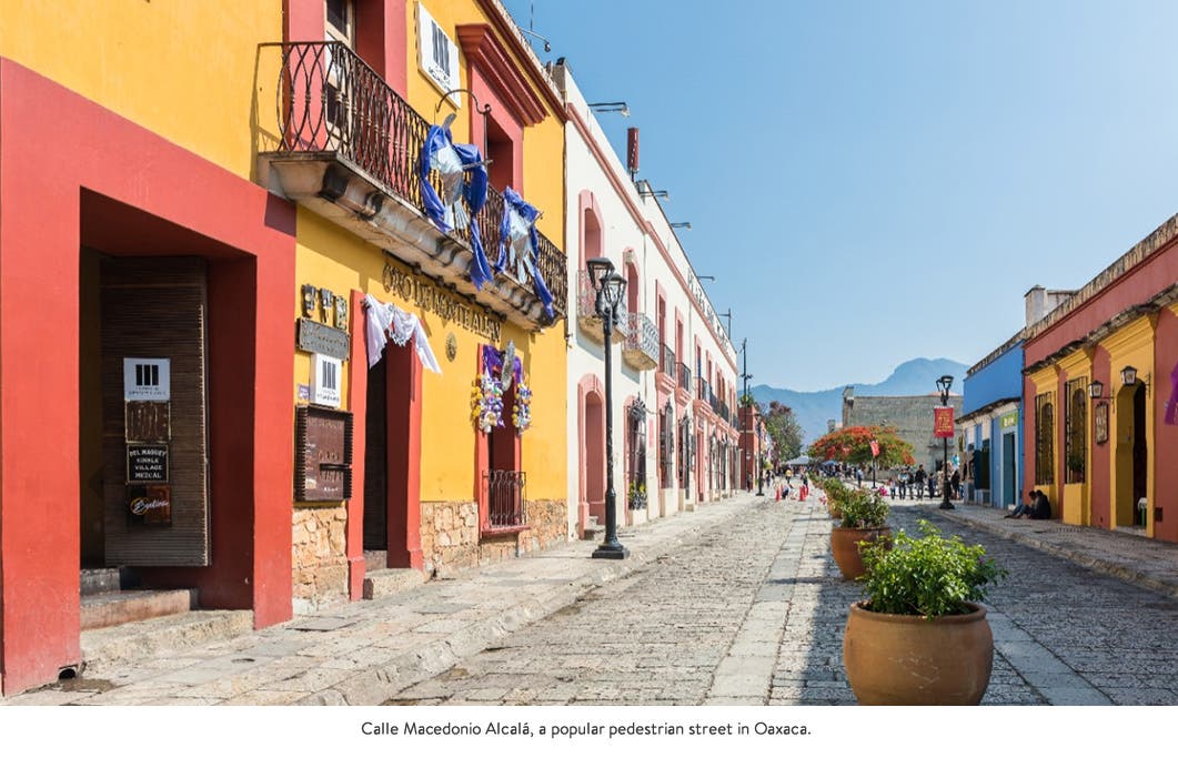 Colorful buildings and cobblestone streets of Oaxaca.