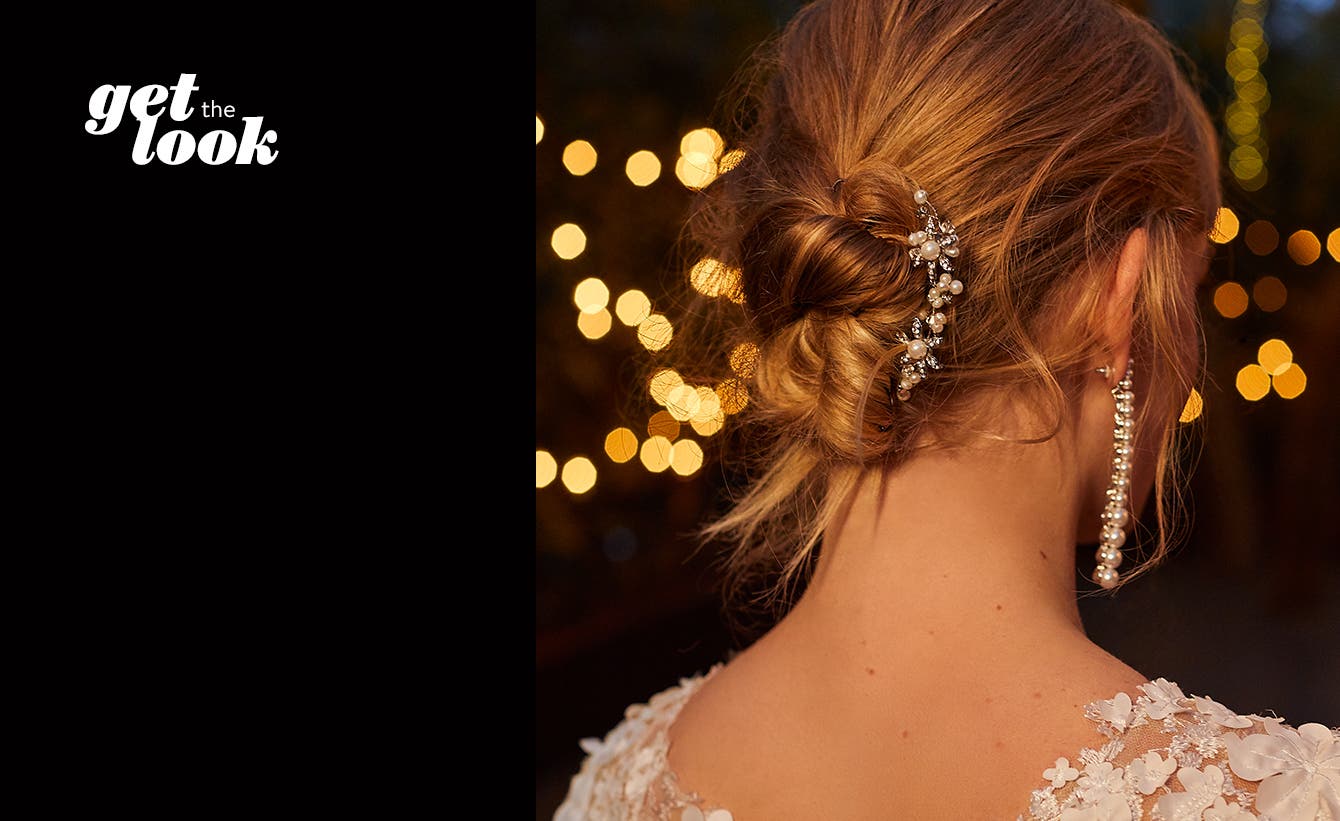 Say "updo" with a boho-chic twisted bun.