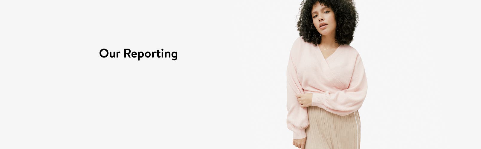 A woman in a pink wrap sweater.