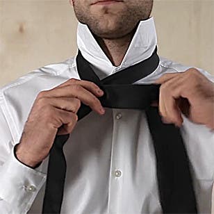 How to tie a four-in-hand knot.