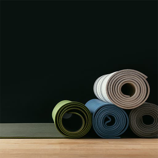 A stack of yoga mats.