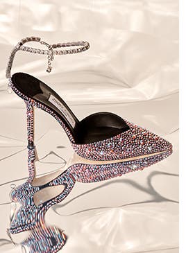Jeweled ankle-strap high heels.