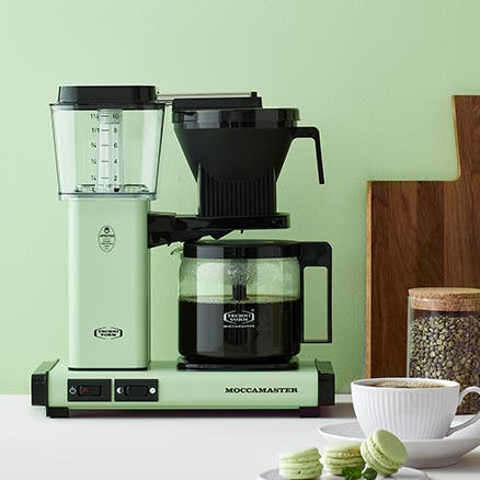 Green Moccamaster coffee brewer.