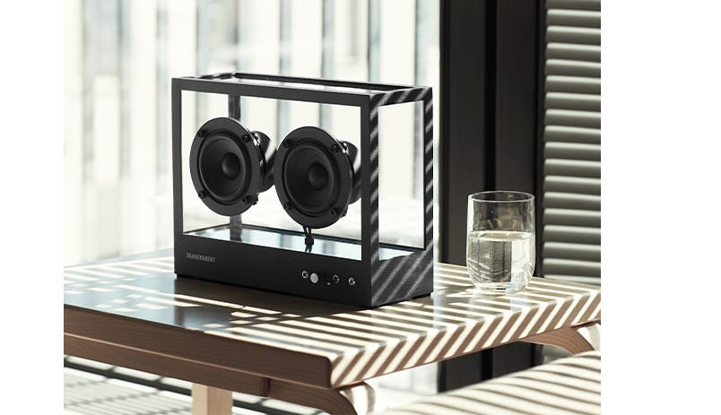 Transparent Sound's small Transparent Speaker on a table.