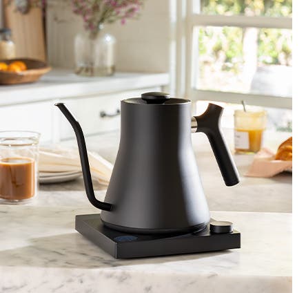 A black electric pour-over kettle.