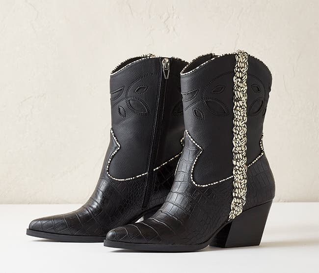 A pair of black western style booties.