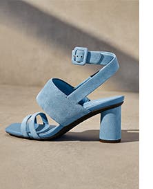 A blue sandal with an ankle strap.