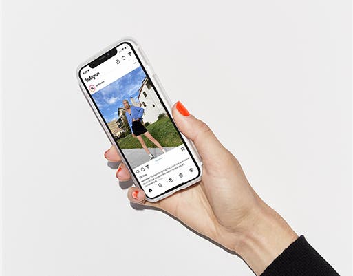 A phone showing a Nordstrom Instagram page.