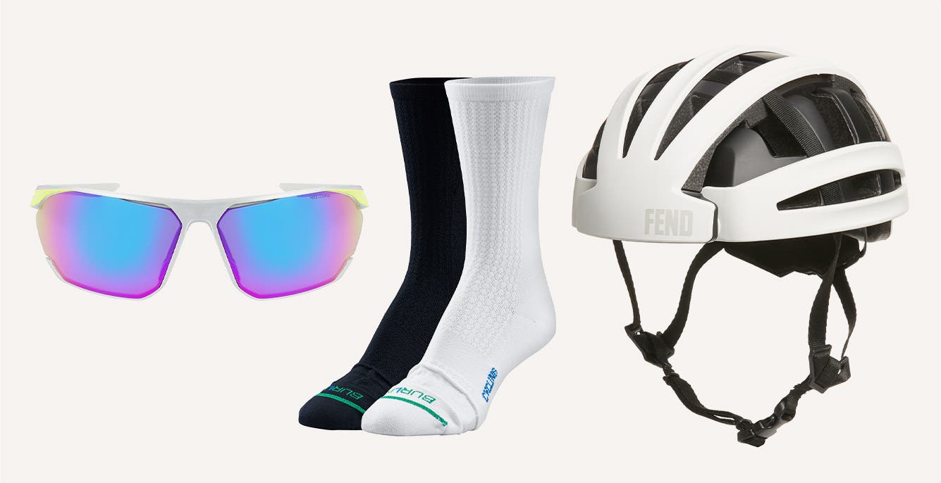 Mirrored Nike athletic sunglasses; BURLIX black and white cycling crew socks; a white biking helmet from FEND.
