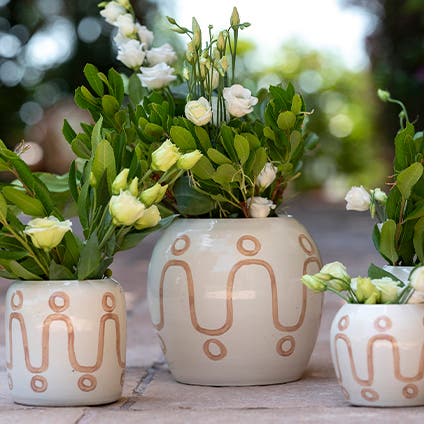 Three ceramic vases.