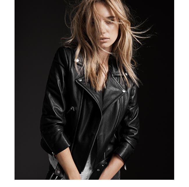Model wearing leather jacket designed by Anine Bing.