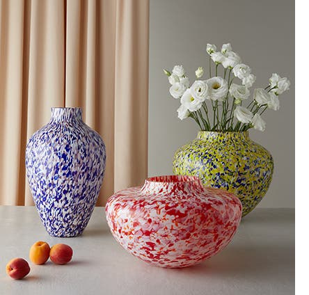 Three textural colored glass vases.