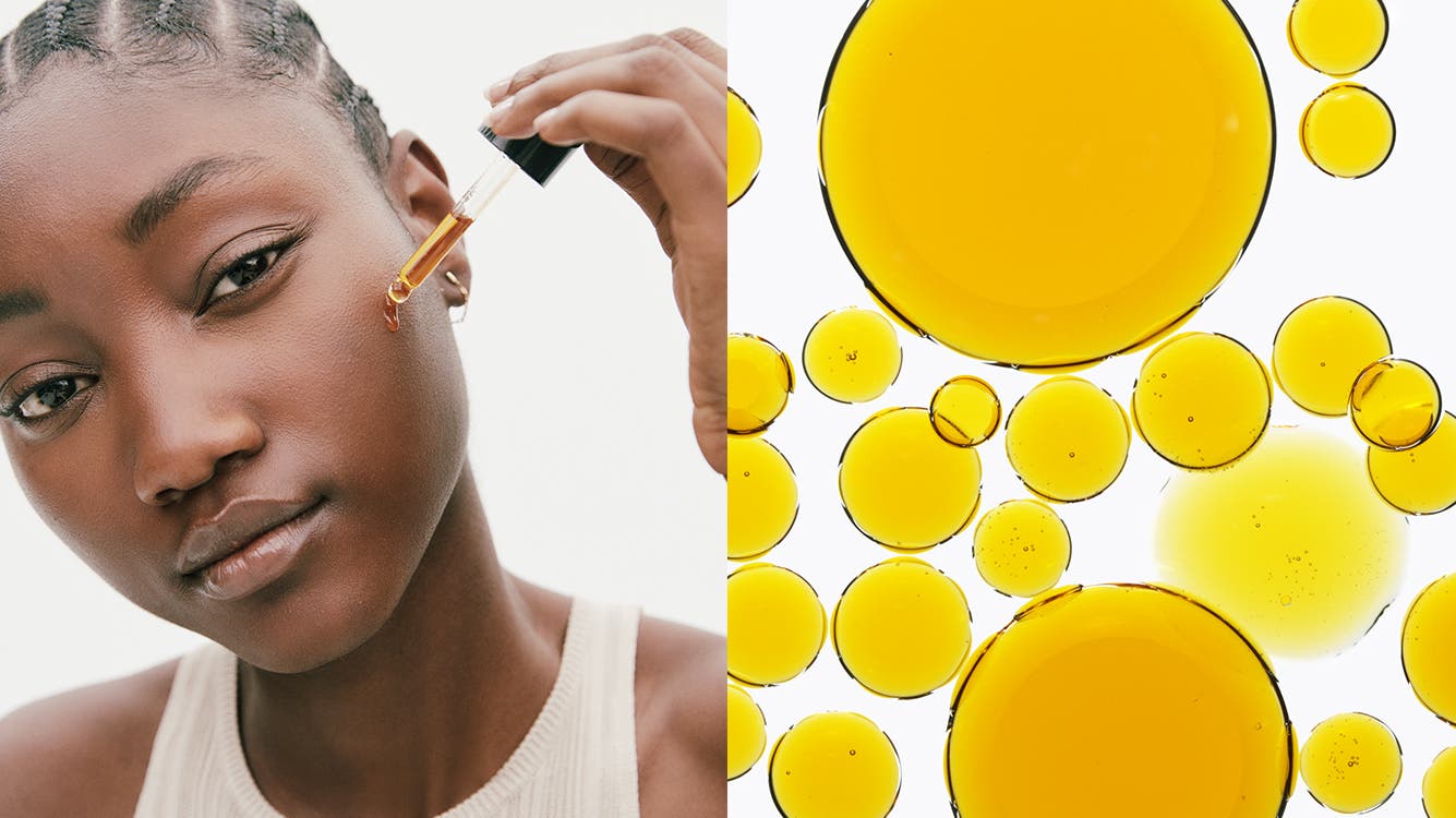 A woman applies a skin care product to her face.