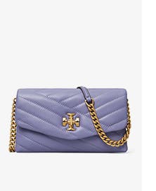 A quilted purple bag with a chain strap.