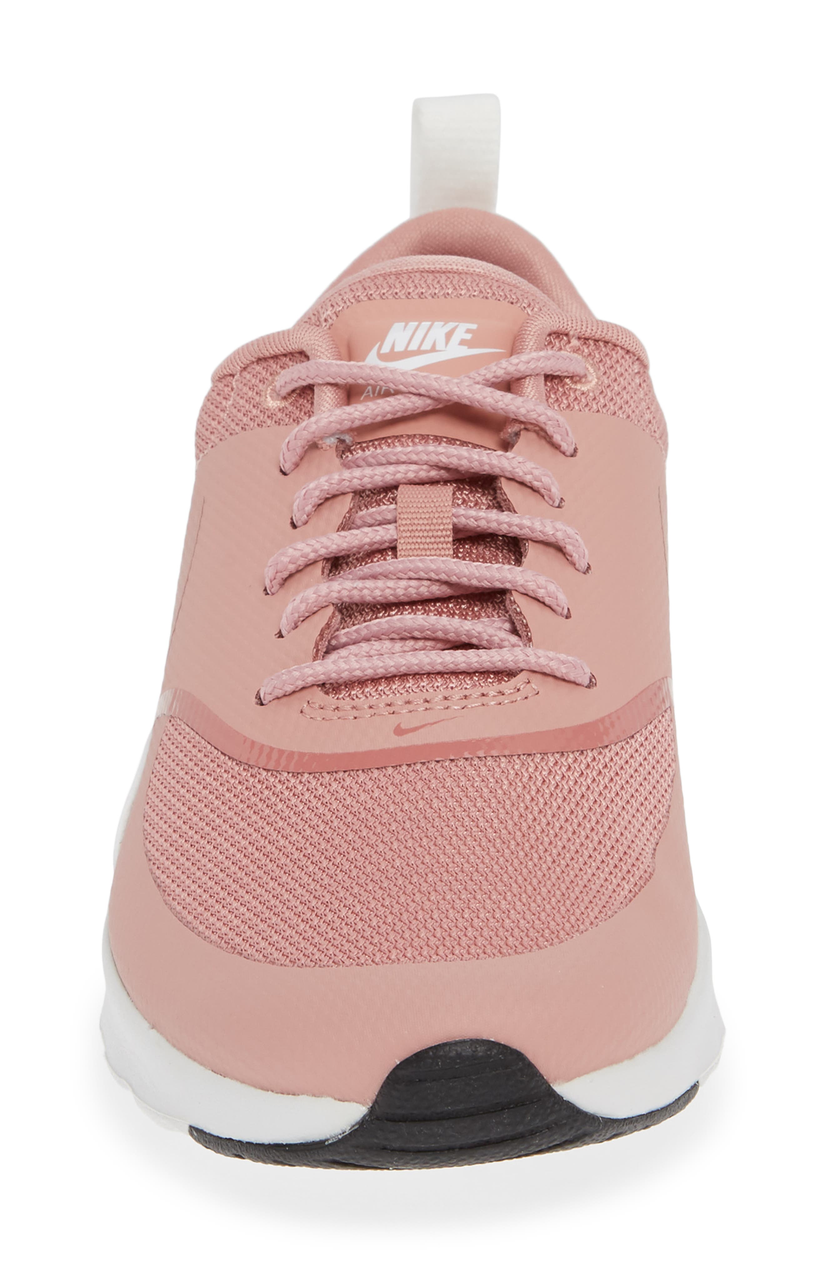 nike thea rust pink