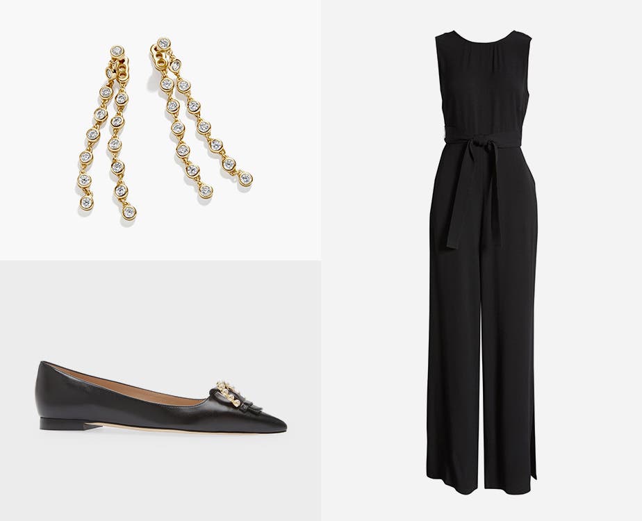 Drop earrings, a black jumpsuit and black flats.