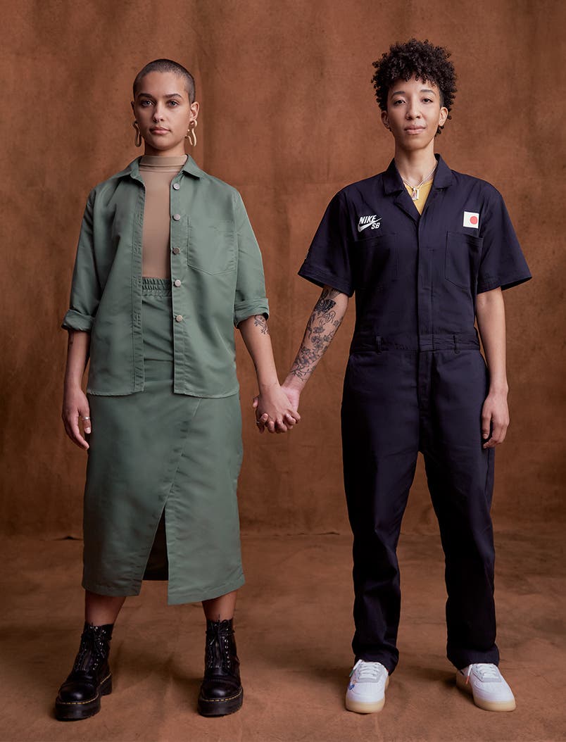 Keyara Murray and Madison Shorter hold hands.