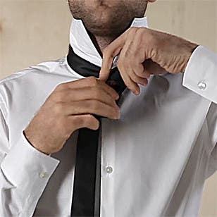 How to tie a four-in-hand knot.