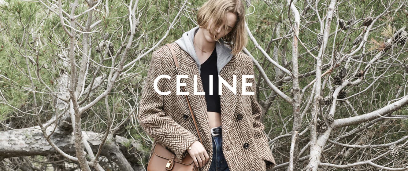 Woman in Celine clothing and accessories.