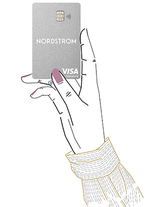 Hand holding Nordstrom credit card.