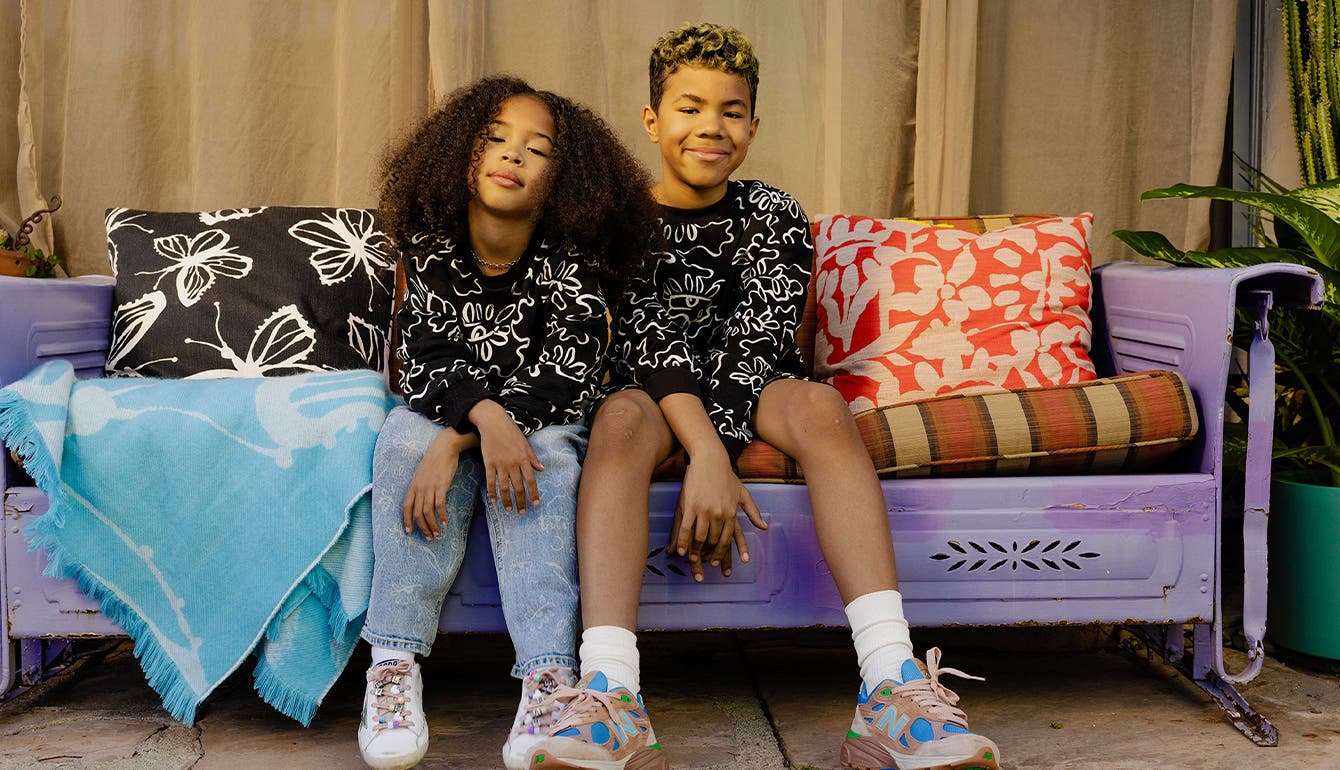 Cristina's kids wear Nordstrom by Cristina Martinez, surrounded by pillows from the new collection.