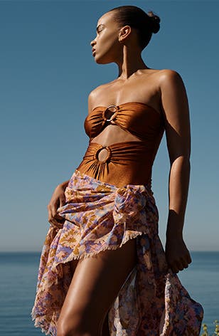 Model wearing designer summer pieces.