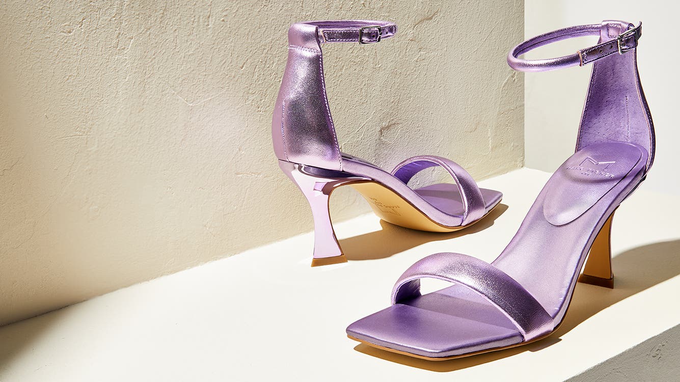 Metallic, purple ankle-strap sandals.