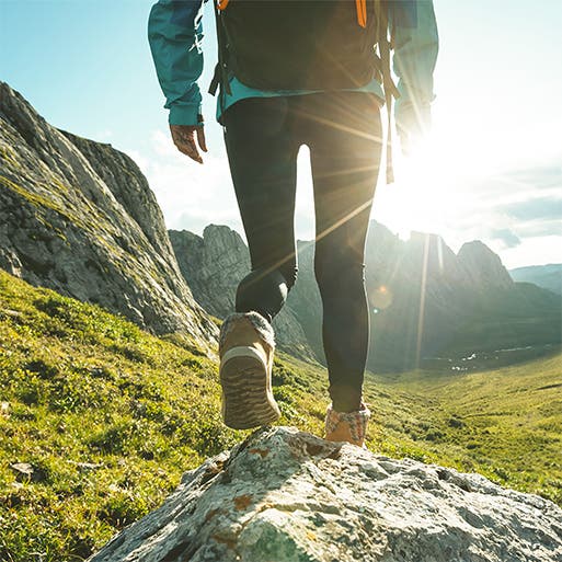 A close-up view of a person hiking.