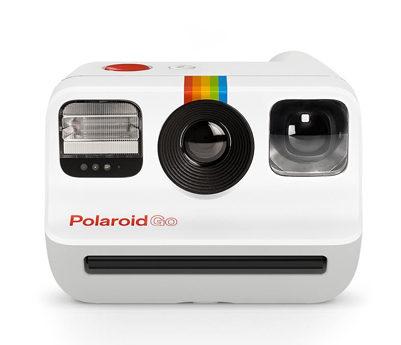 A white Polaroid instant camera.