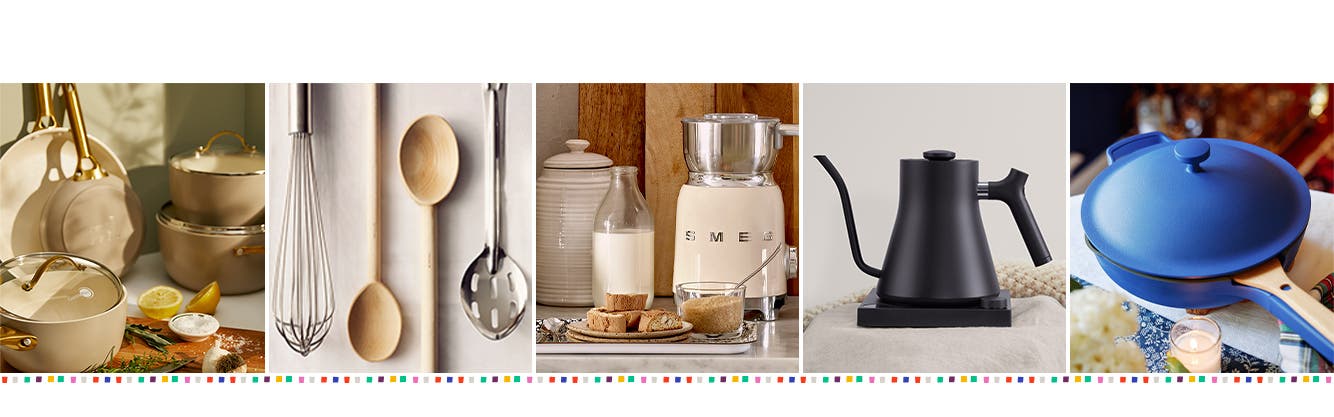 Cream-colored pots and pans with gold hardware. A whisk, two wooden spoons and a metal spoon. A small coffeemaker with a glass milk jar and pastries. An electric tea kettle. A cobalt-blue cooking pan with matching lid.