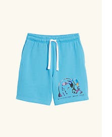 Blue athletic shorts with graphic art.