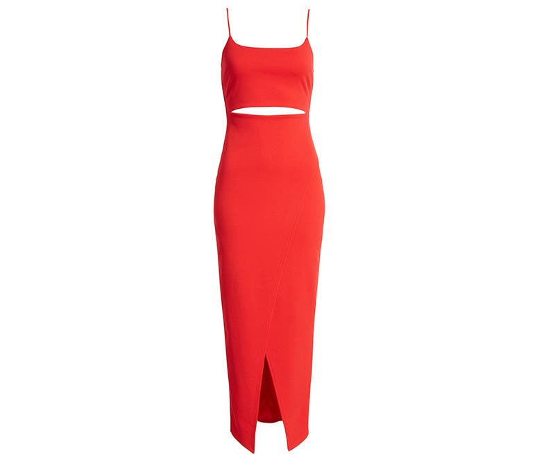 A red cutout bodycon dress with a slit in the front.