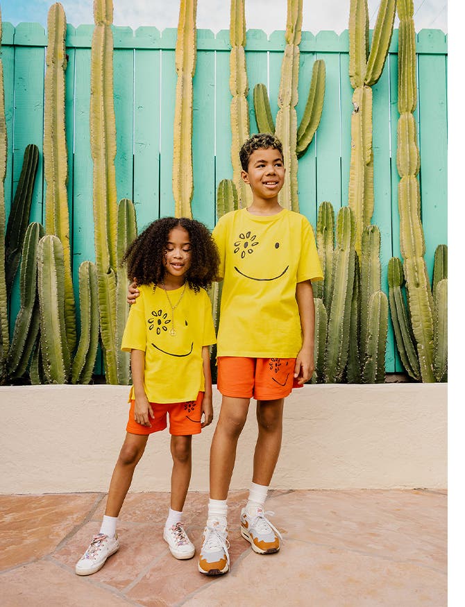 Cristina's kids wear Nordstrom by Cristina tees and shorts.